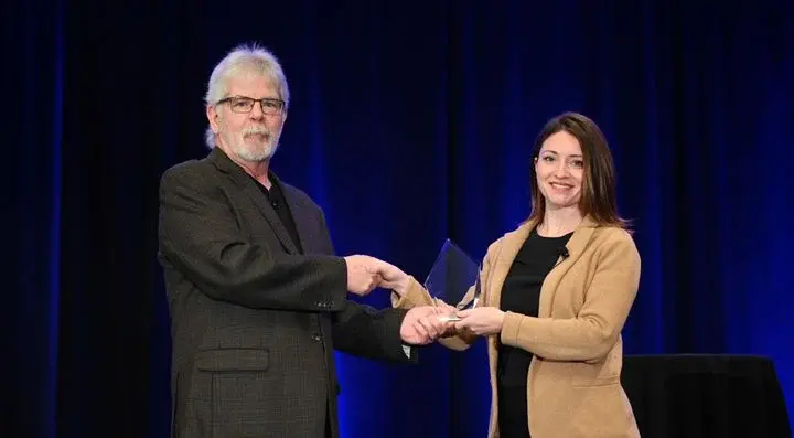 Sarah Cates Receiving An Award