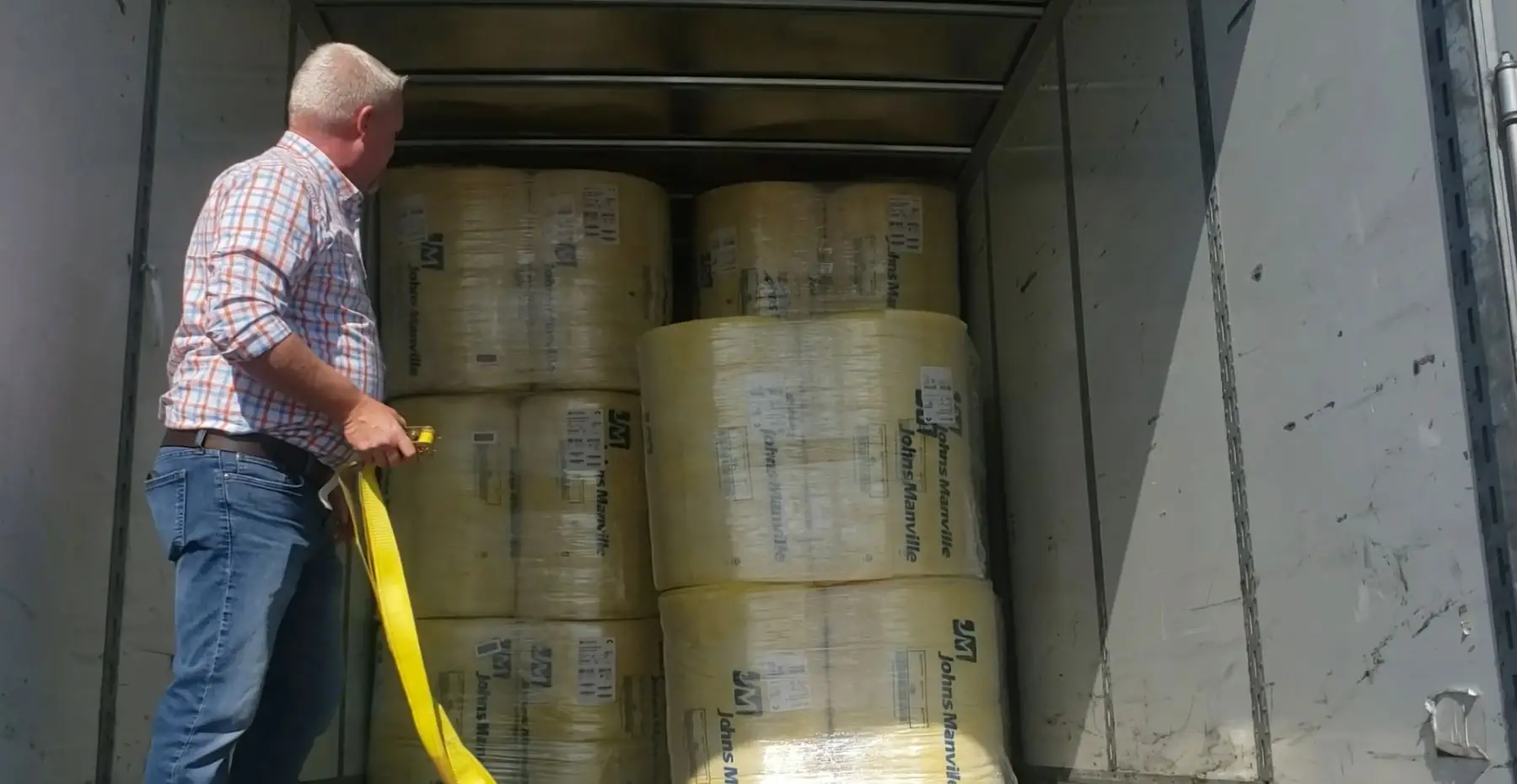 Checking Proper Cargo Securement on Back of Trailer