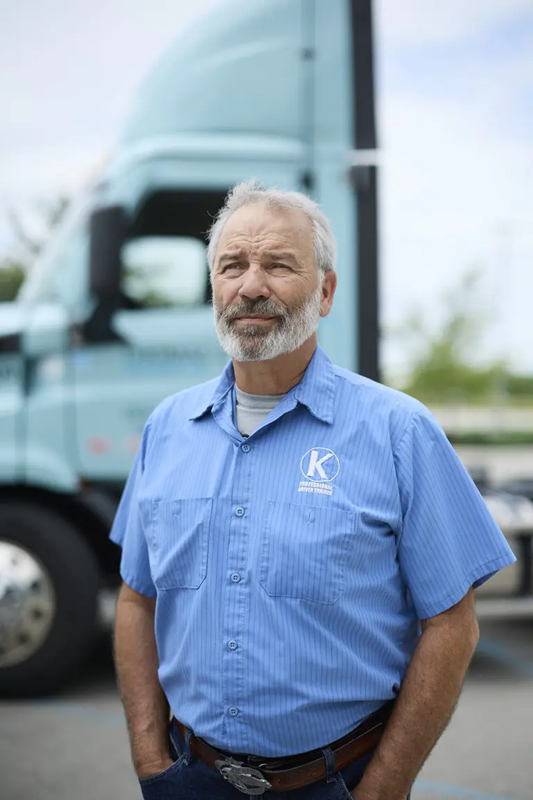 Keller Truck Driver In Front Of A Semi Truck